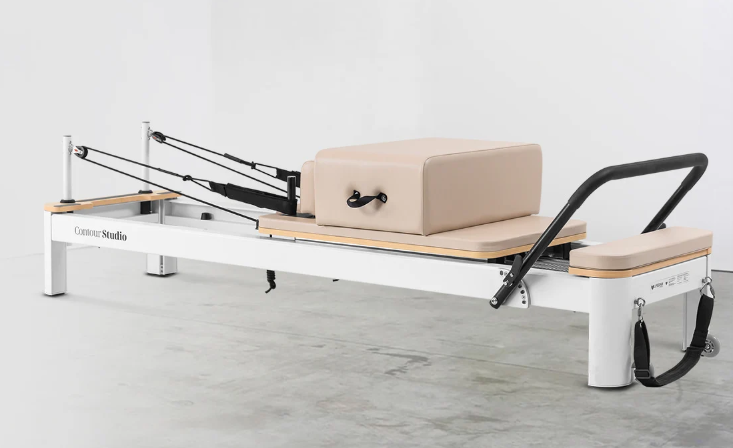 Contour Studio Commercial beige Pilates reformer with aluminium frame and Pilates box